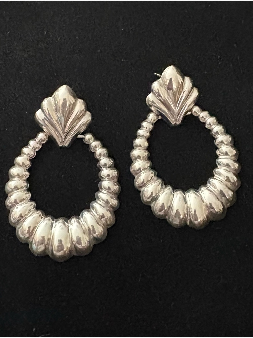 Up for sale is a beautiful pair of vintage sterling silver drop hoop earrings fe